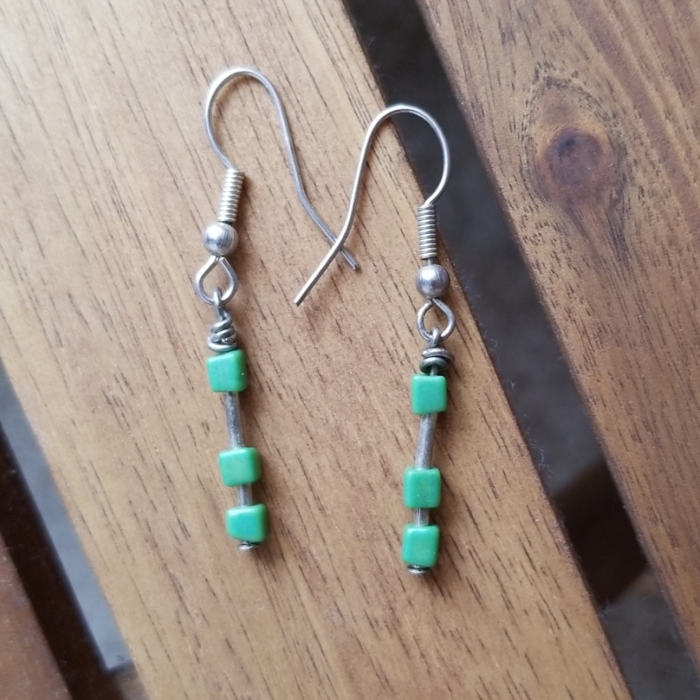 Green geometric earrings